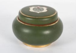 A Macintyre & Co pot and cover of circular form,