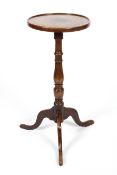 A George III mahogany tripod wine table, the circular top inlaid with octagonal marquetry,