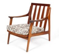 A 1960's vintage Danish influenced teak wood lounge chair/armchair,