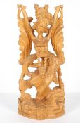 An |ndian sandalwood figure, possibly Krishna,
