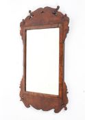 A George I or II walnut fretwork mirror,