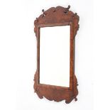 A George I or II walnut fretwork mirror,