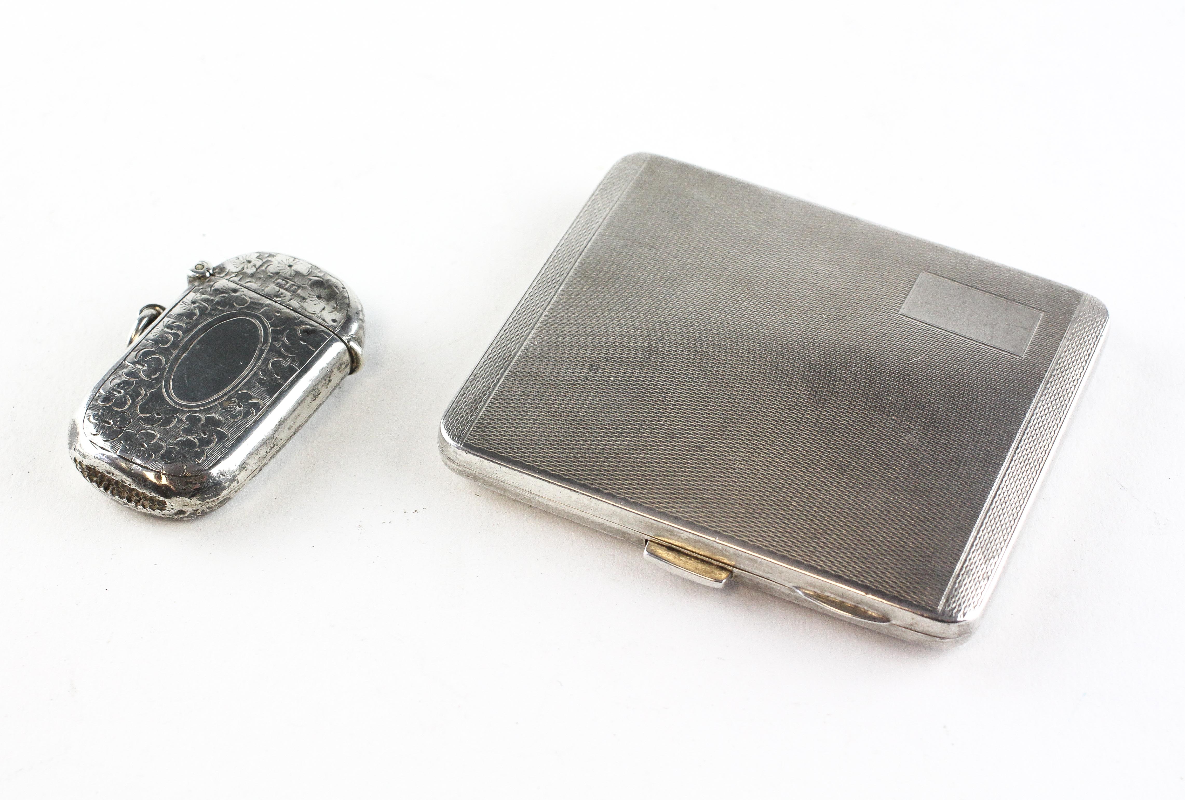 A silver cigarette case with engine turned decoration, hallmarked for Brimingham 1933,