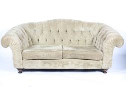A contemporary chesterfield two-seater sofa by 'John Sankey', upholstered in beige chenille,