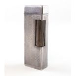 A vintage Dunhill pocket lighter,