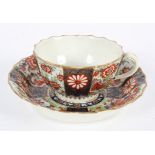 A Worcester Teacup and Saucer, of Warmstry Fluted form, in a Japan pattern, square seal marks,