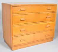 A 1940's retro vintage golden oak utility furniture chest of drawers comprising of a straight set