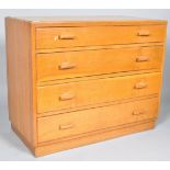 A 1940's retro vintage golden oak utility furniture chest of drawers comprising of a straight set