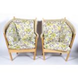 A pair of Semarang contemporary conservatory lounge chairs made by The Fair Trade Company