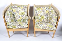 A pair of Semarang contemporary conservatory lounge chairs made by The Fair Trade Company