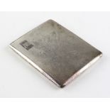 A mid century cigarette case of rectangular form with engine turned decoration throughout,