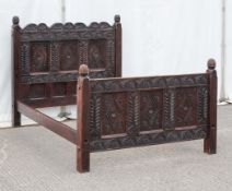 A Wood Carvers Guild Double bed,