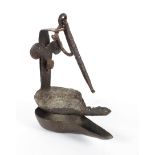 An antique wrought iron 'Whale' oil lamp,