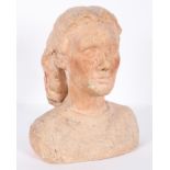 Manner of Jacob Epstein, a bust of a young lady, plaster with terracotta tint,