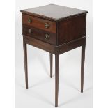 A late 19th/early 20th century mahogany bedside chest of drawers, comprising two short drawers,