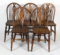 Five oak and elm wheel back dining chairs, 19th/20th century,