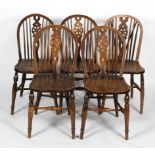 Five oak and elm wheel back dining chairs, 19th/20th century,