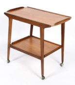 A G-plan style teak tea trolley, with two shelves,