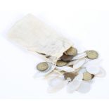 An extensive collection of 19th century Oriental mother of pearl games tokens,