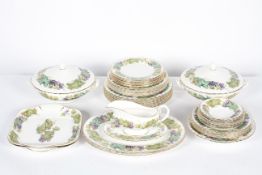 A Royal Worcester 'Vine Harvest' pattern part dinner service for six people, 20th century,