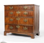 An early 18th century walnut chest of drawers,