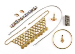 A collection of costume jewellery to include: Two necklaces, A bangle,