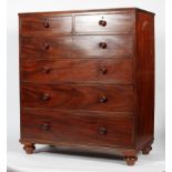 A Victorian mahogany chest of two short and four long drawers on bun feet,