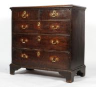 An 18th century oak chest of drawers,