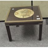 A coffee table with map of the World adorning the top, of square form,