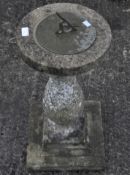 A reconstituted stone sundial with column,