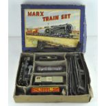 A Louis Marx & co ltd clockwork train set, in original box, including locomotive, tender and track,