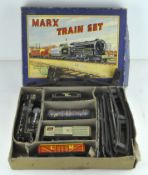 A Louis Marx & co ltd clockwork train set, in original box, including locomotive, tender and track,