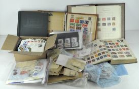 A collection of stamps and First Day covers
