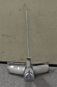 An art deco style chrome ceiling light, three branch, with three cylindrical shades,