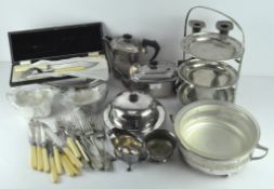 A collection of assorted silver plated wares, to include an art deco tea set, muffin dish,