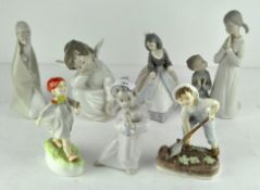 A collection of Lladro figures, to include two cherubs, largest 21cm high,