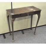 An early 20th century side table with single drawer to front,