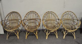 A set of four wicker chairs,