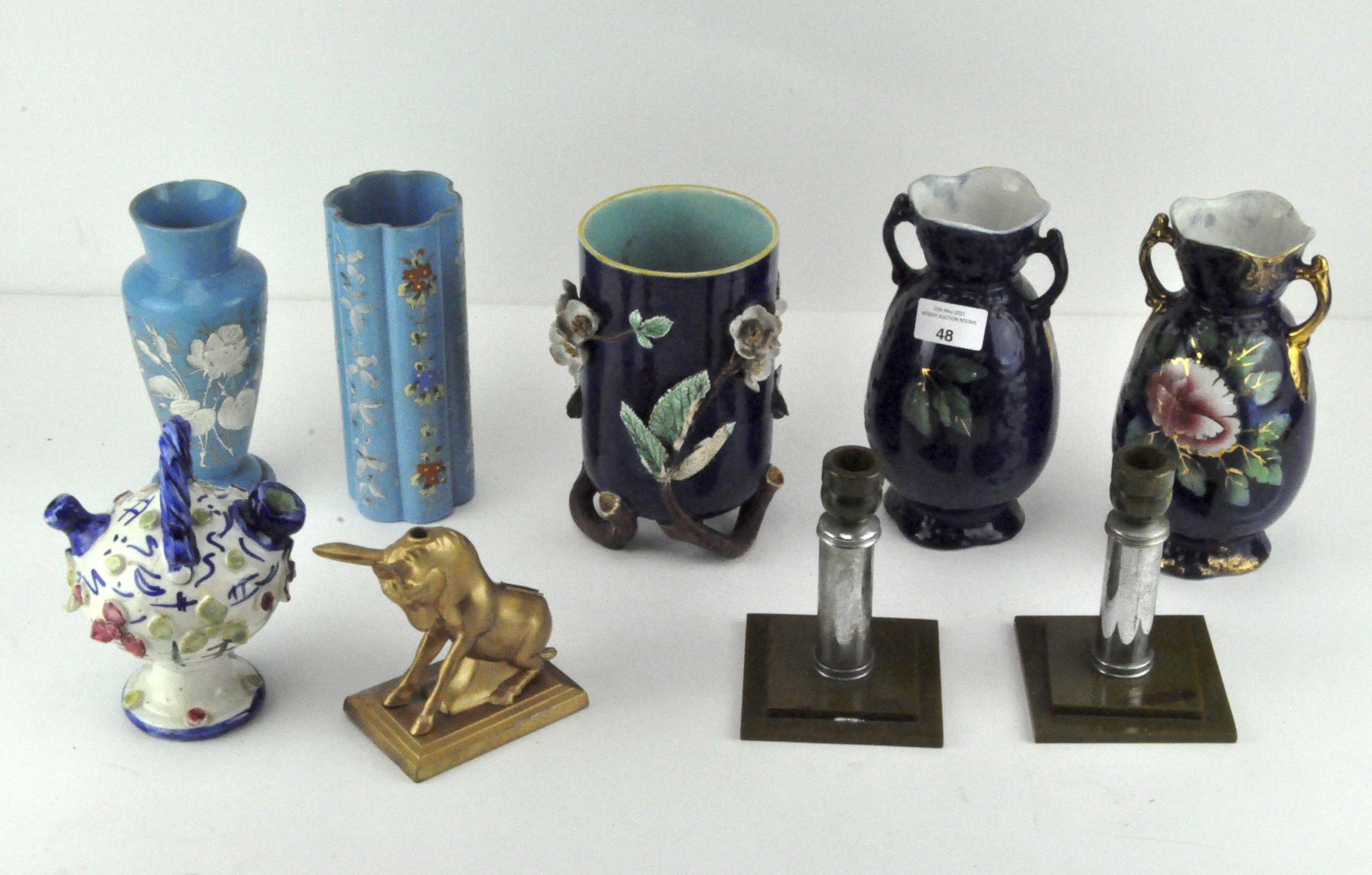 A pair of Art Deco bakelite and chrome candlesticks,H 13cm, a majolica vase and other ceramics