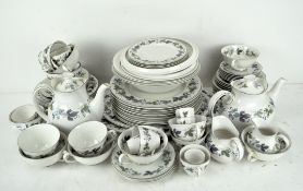 A Doulton 'Burgundy' pattern part tea and dinner-service, including plates, serving-dishes, teapot,