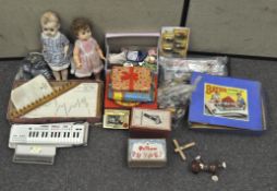 A large collection of assorted toys, to include dolls, jigsaws, Airfix model plane kit,