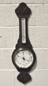 An Edwardian oak aneroid barometer by H R Phillips,