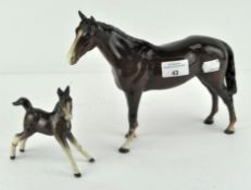 Two Beswick horses, tallest 21cm.