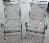Two matching metal garden chairs,