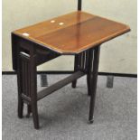 An early 20th century mahogany Sutherland table, the borders with inlaid detailing,