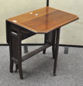 An early 20th century mahogany Sutherland table, the borders with inlaid detailing,