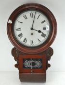 A mahogany wall clock, the dial with Roman numerals denoting hours,