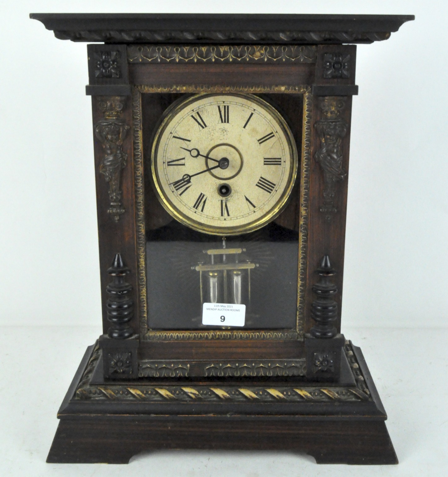 An early 20th century mantel clock by Junghams, the dial with Roman numerals denoting hours,