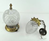 Two moulded glass ceiling lights with brass mounts. Taller 31cm.