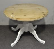 A pine breakfast table of circular form,